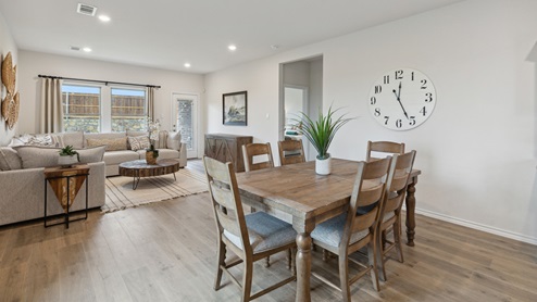 2110 Woodrose Court two-story model at Cartwright Ranch in Crandall, TX dining area with views of living area