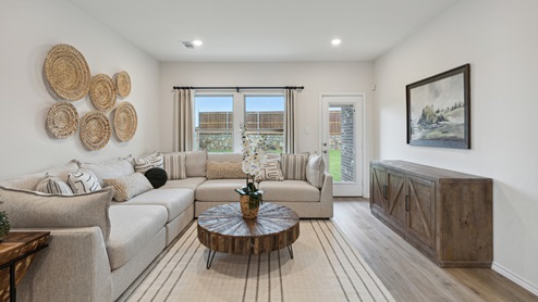 2110 Woodrose Court two-story model at Cartwright Ranch in Crandall, TX open concept living area with natural lighting