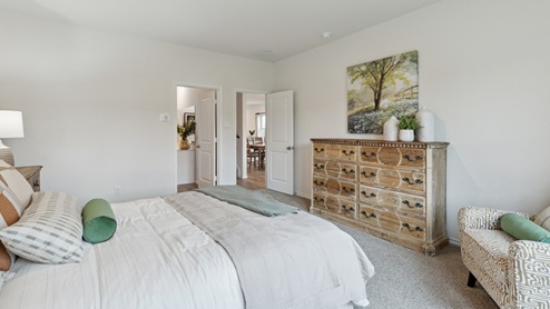 2110 Woodrose Court two-story model at Cartwright Ranch in Crandall, TX primary bedroom with natural lighting