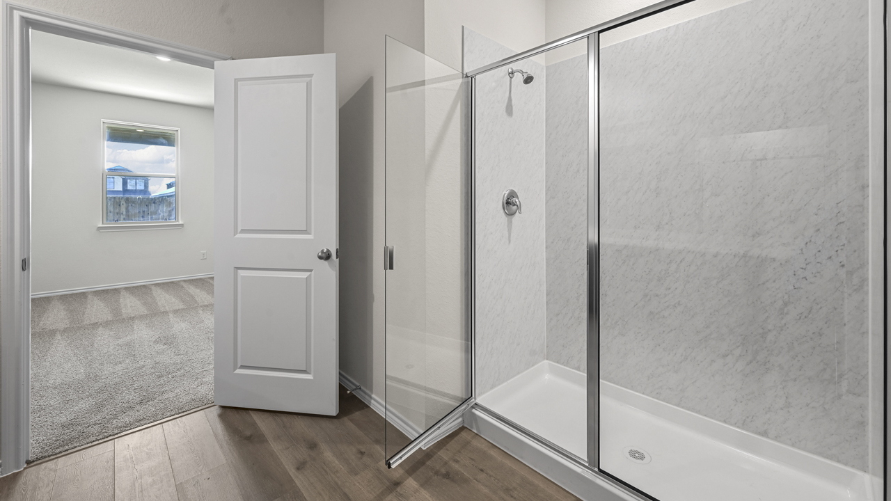 a bathroom with a glass shower