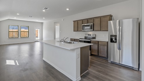 X30C kitchen area with view of living area