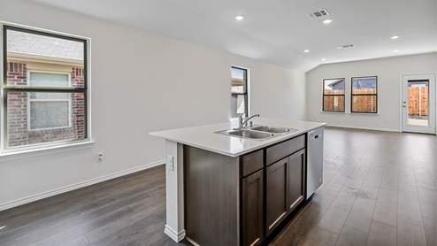 X30C kitchen area with view of living area