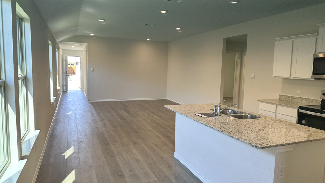 living area with hardwood floors and open concept living space