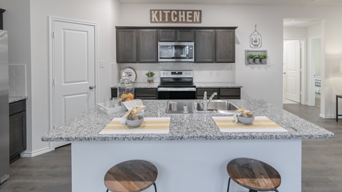 X30D kitchen island with dark cabinets
