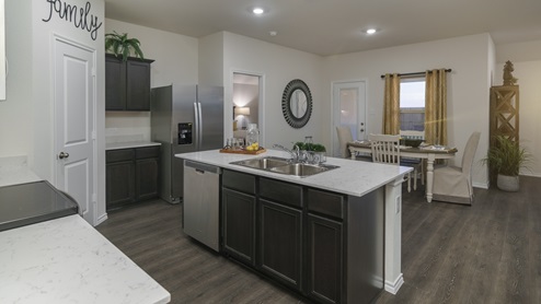 2914 Drury Lane at Stonewyck Farms in Ennis, TX kitchen area with view of dining area