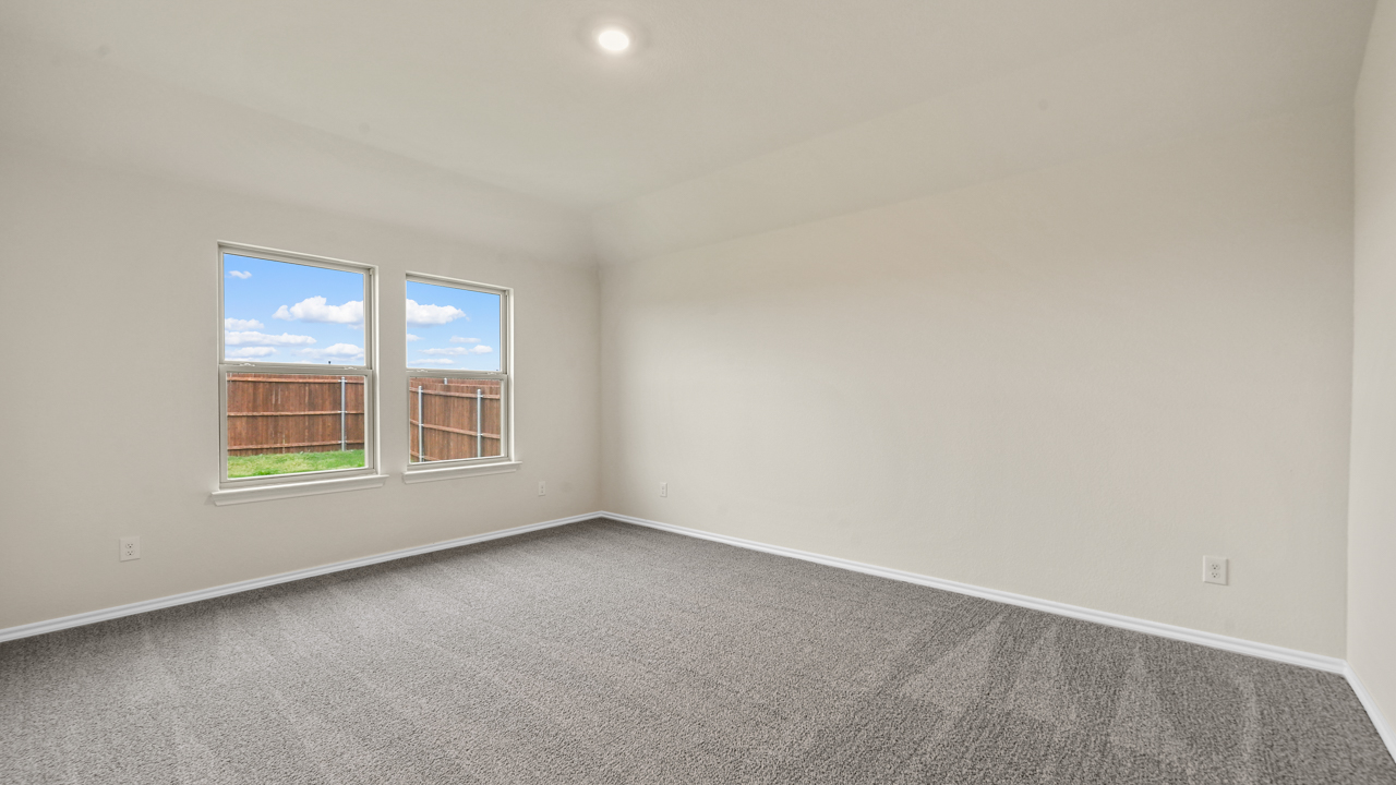 X40I primary bedroom with natural light