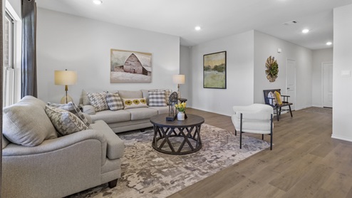 Large open living area with view into the entry hallway