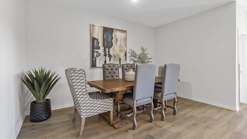 Dining area with table and chairs