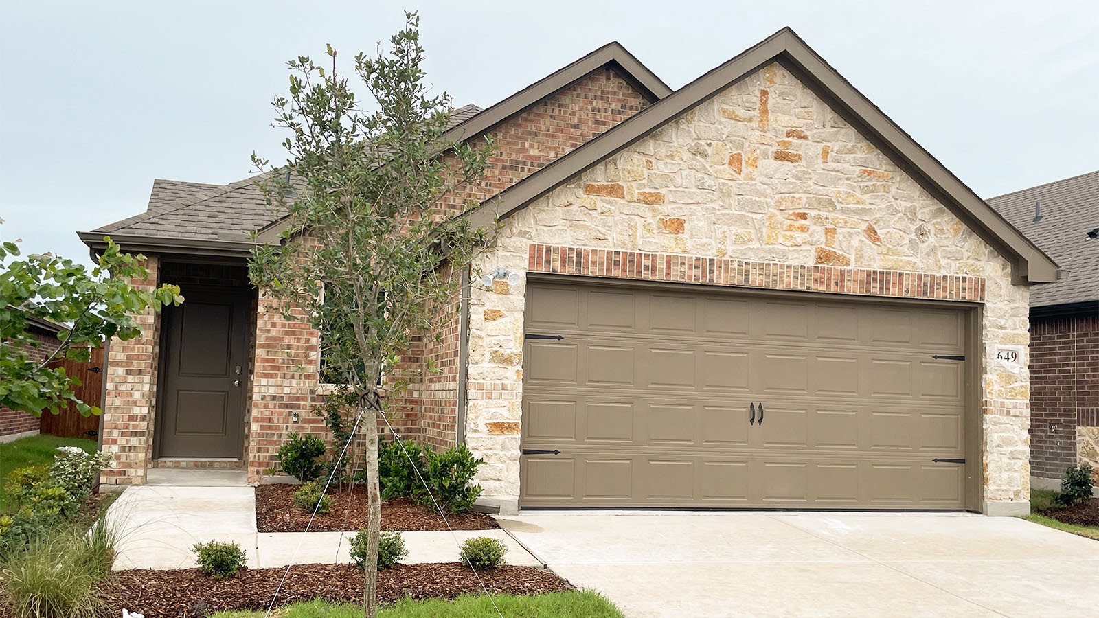 exterior with brick and stone