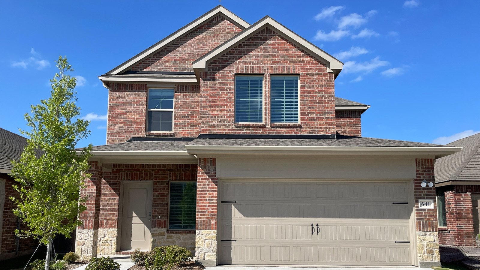 exterior with brick and stone