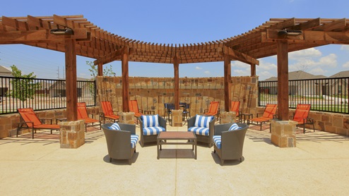 Elevon in Lavon, TX - D.R. Horton New Homes - Awning and Swimming Pool Seating
