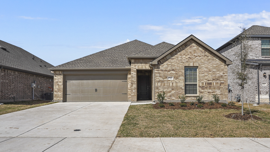 exterior of one story home with brick