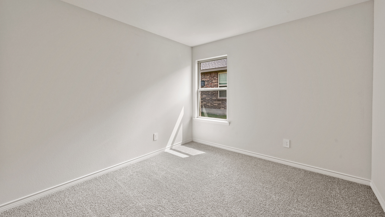 bedroom with gray carpet