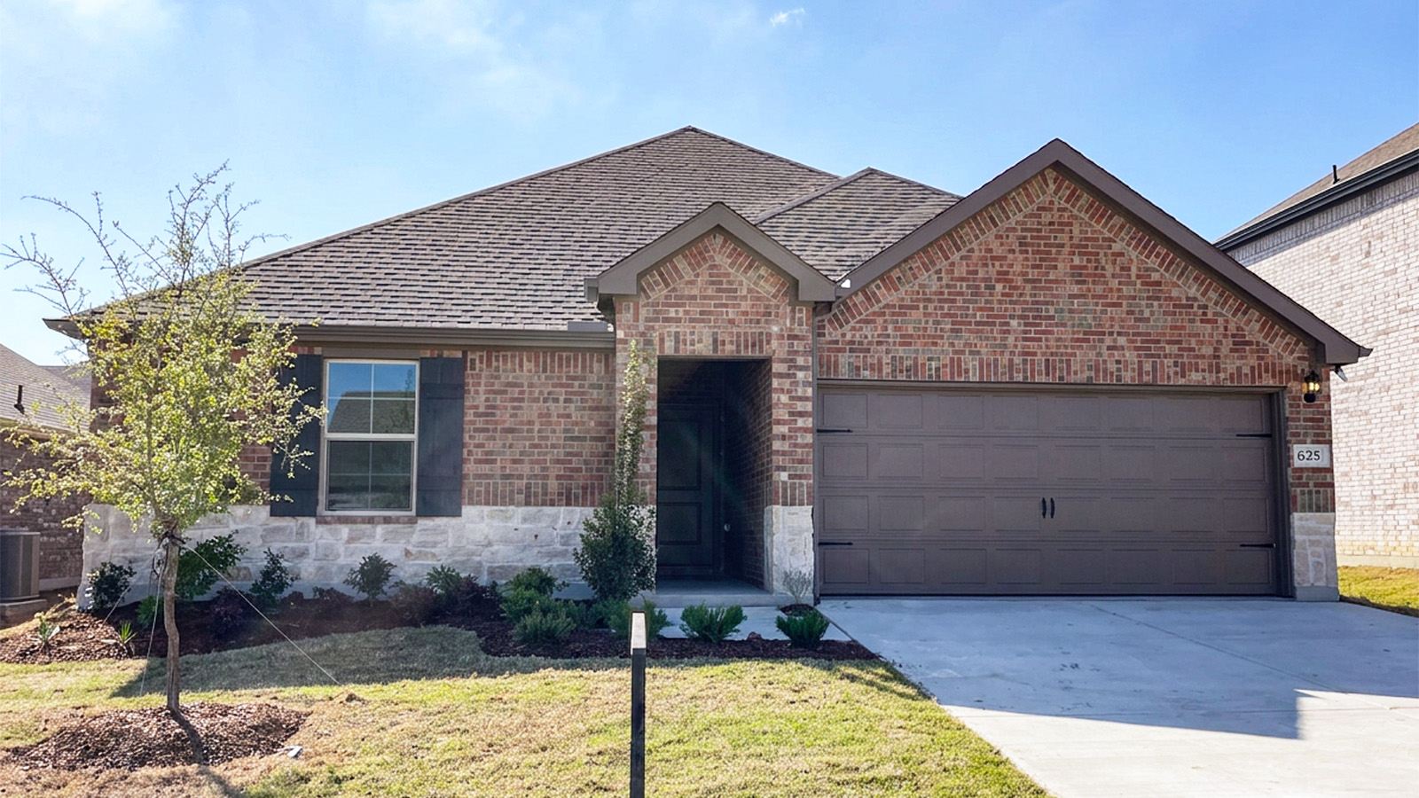 exterior with brick and stone