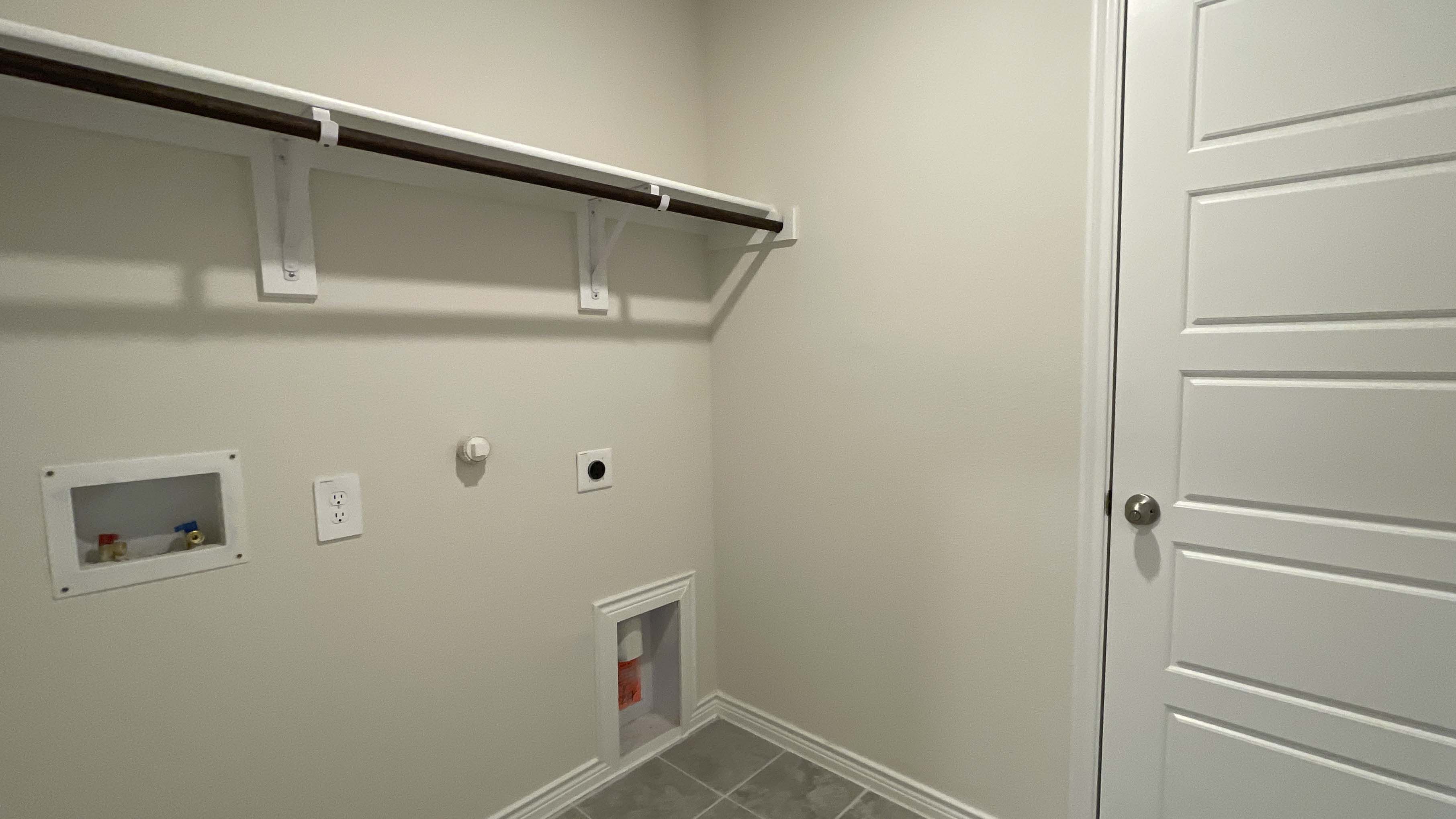 utility area for washer and dryer