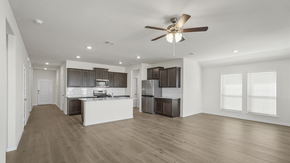 kitchen/living area with wood floors