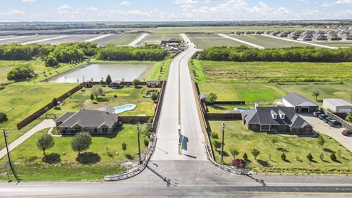 Drone aerial photo of community entry and overview of community area