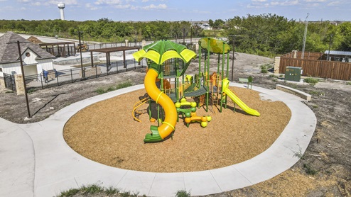 Aerial photo of community playground with walking trail