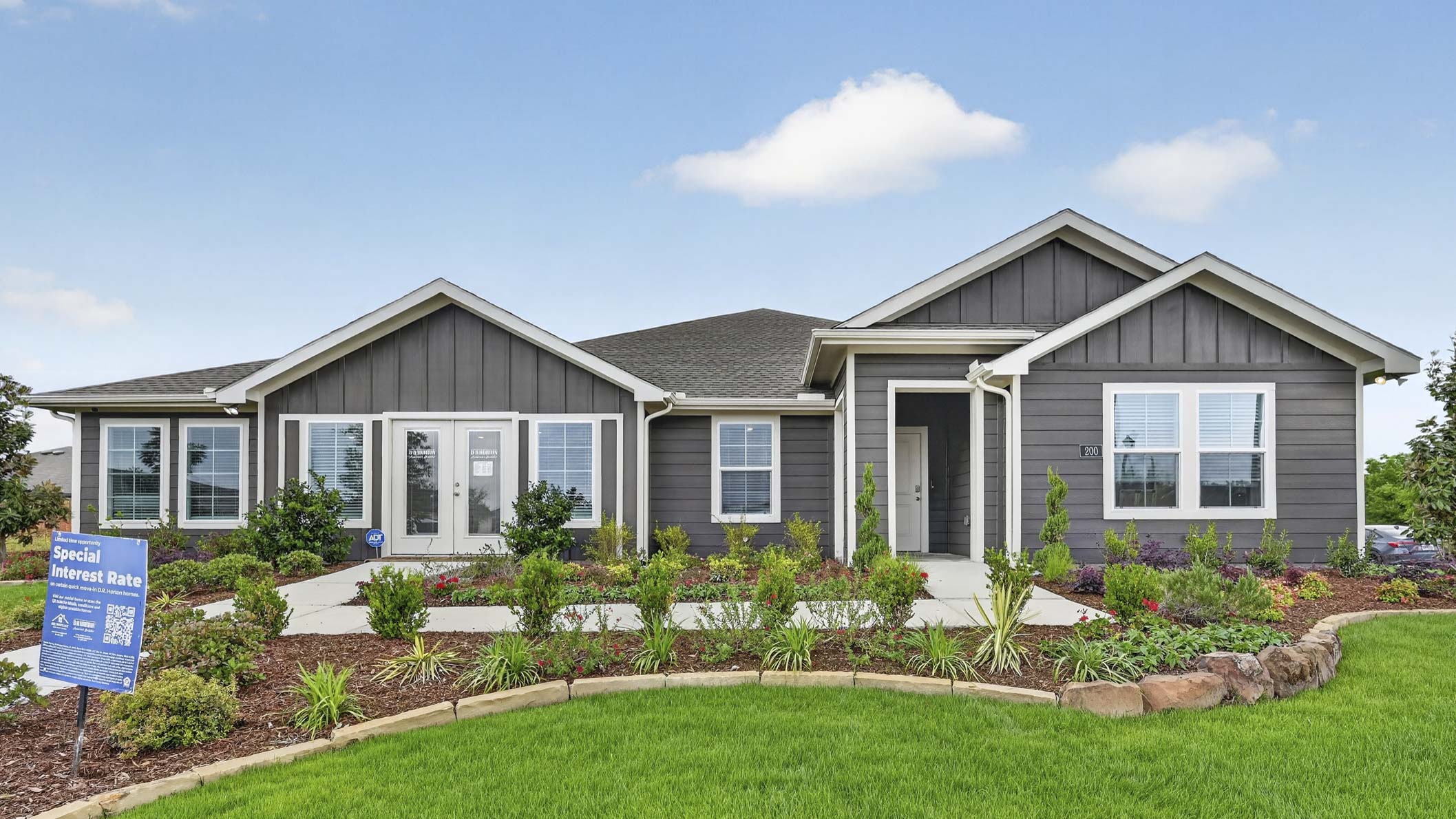 exterior of one story home with siding