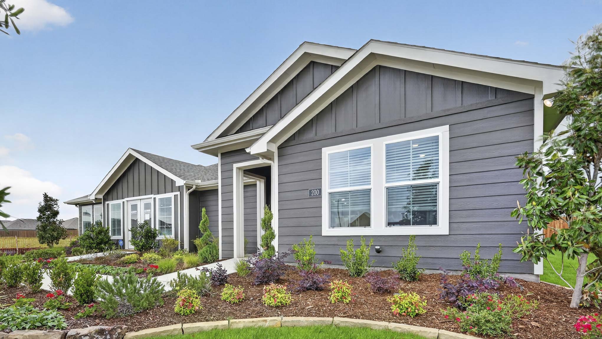 exterior of one story home with siding