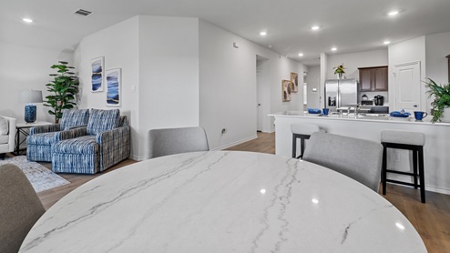450 Lucky Lane at Bluff Springs in Ferris, TX dining area with view of open concept living area