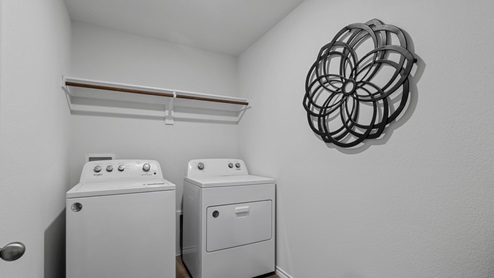 450 Lucky Lane at Bluff Springs in Ferris, TX utility area for washer and dryer