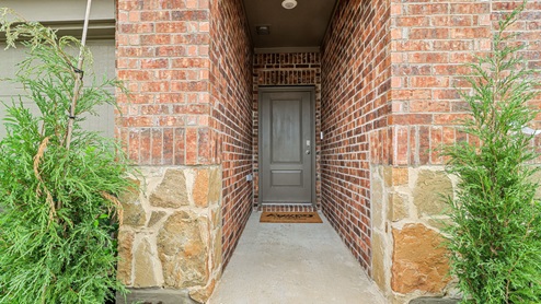 454 Lucky Lane at Bluff Springs in Ferris, TX exterior entrance