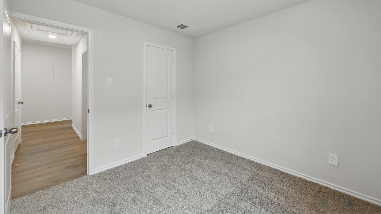 Bedroom 3 with light grey carpet
