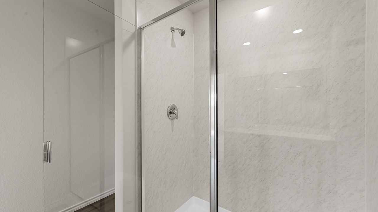 a bathroom with a glass shower