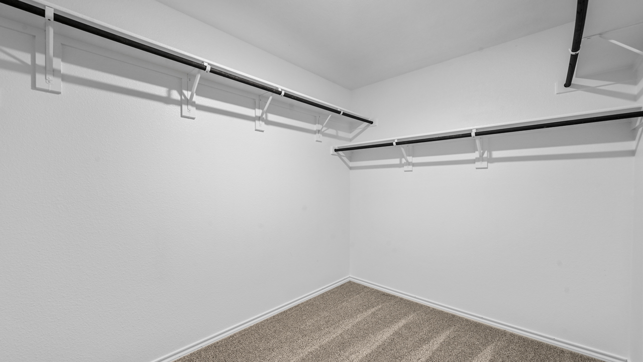 a closet with shelves and racks