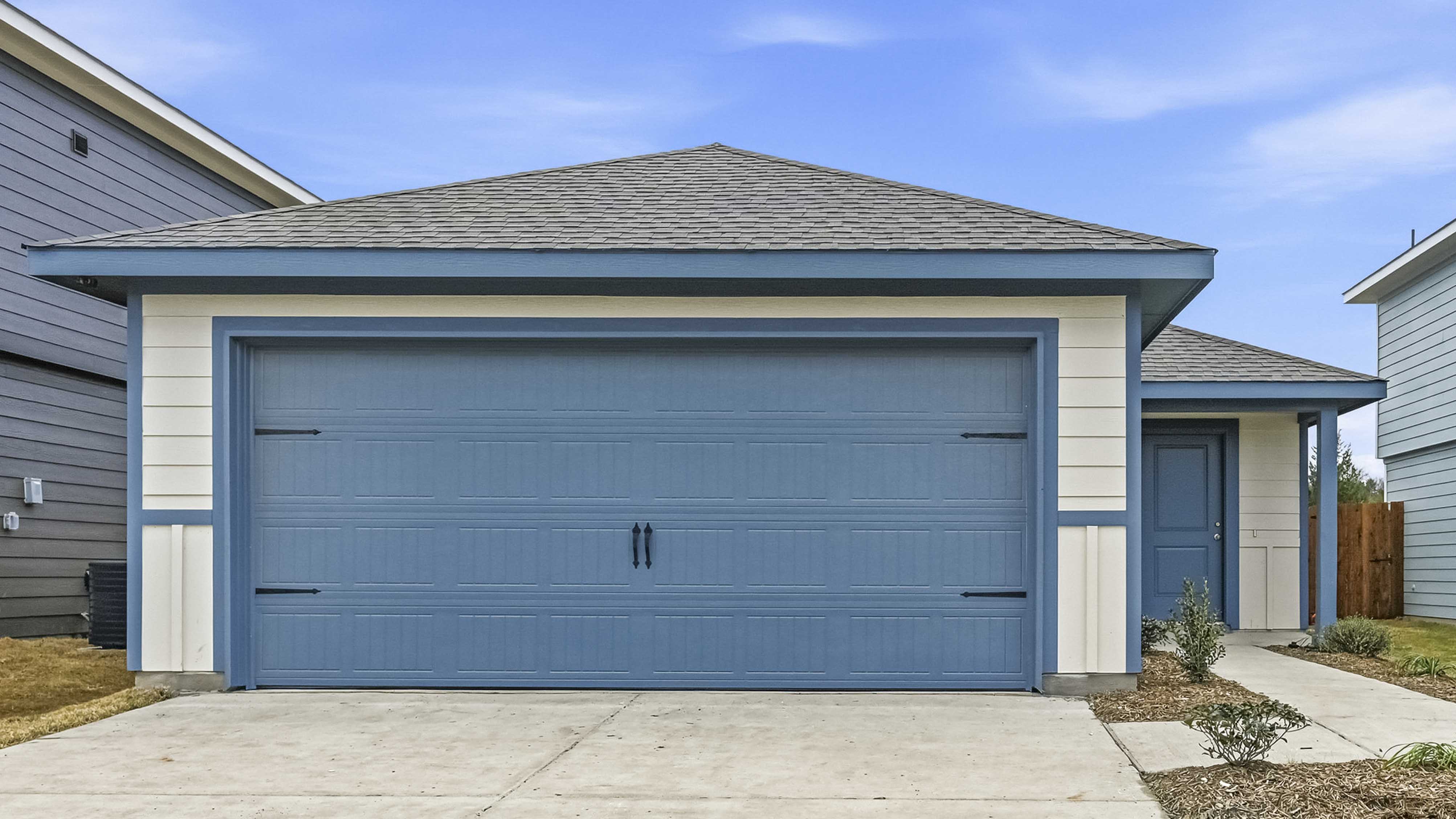 exterior of one story home with siding