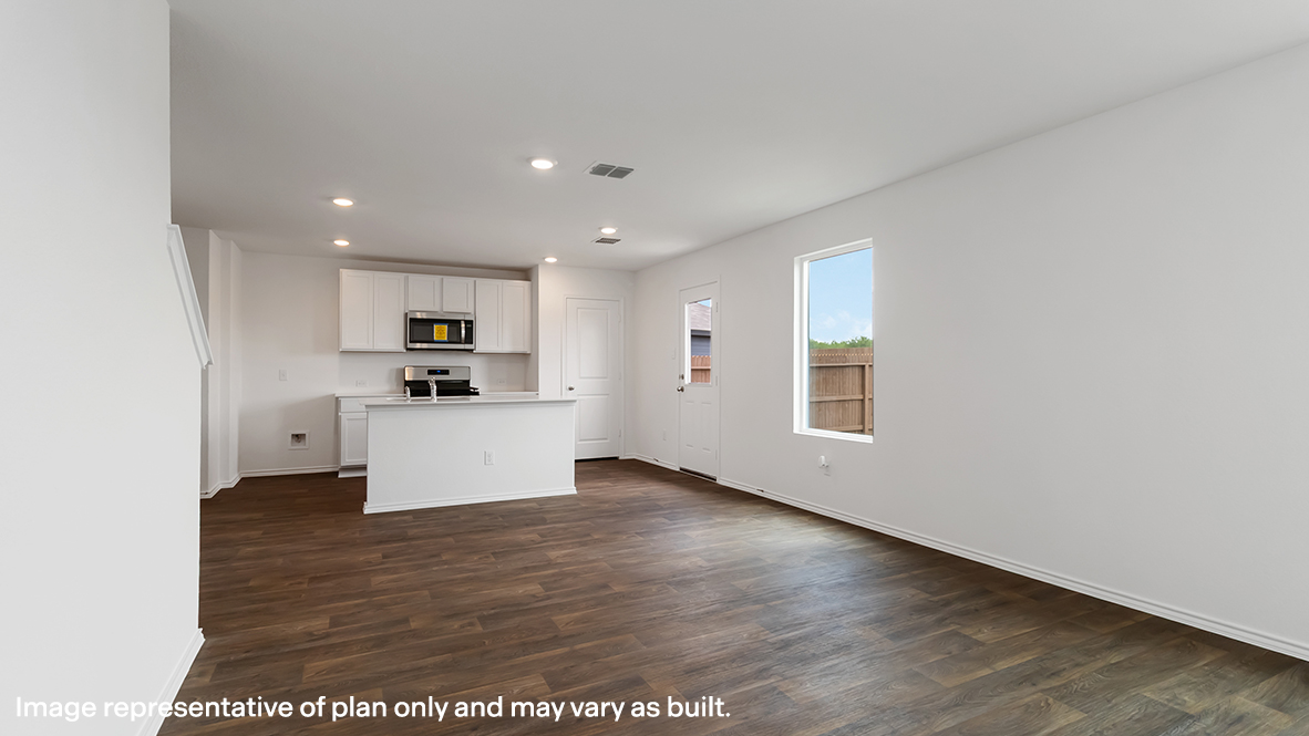 kitchen with island and living room