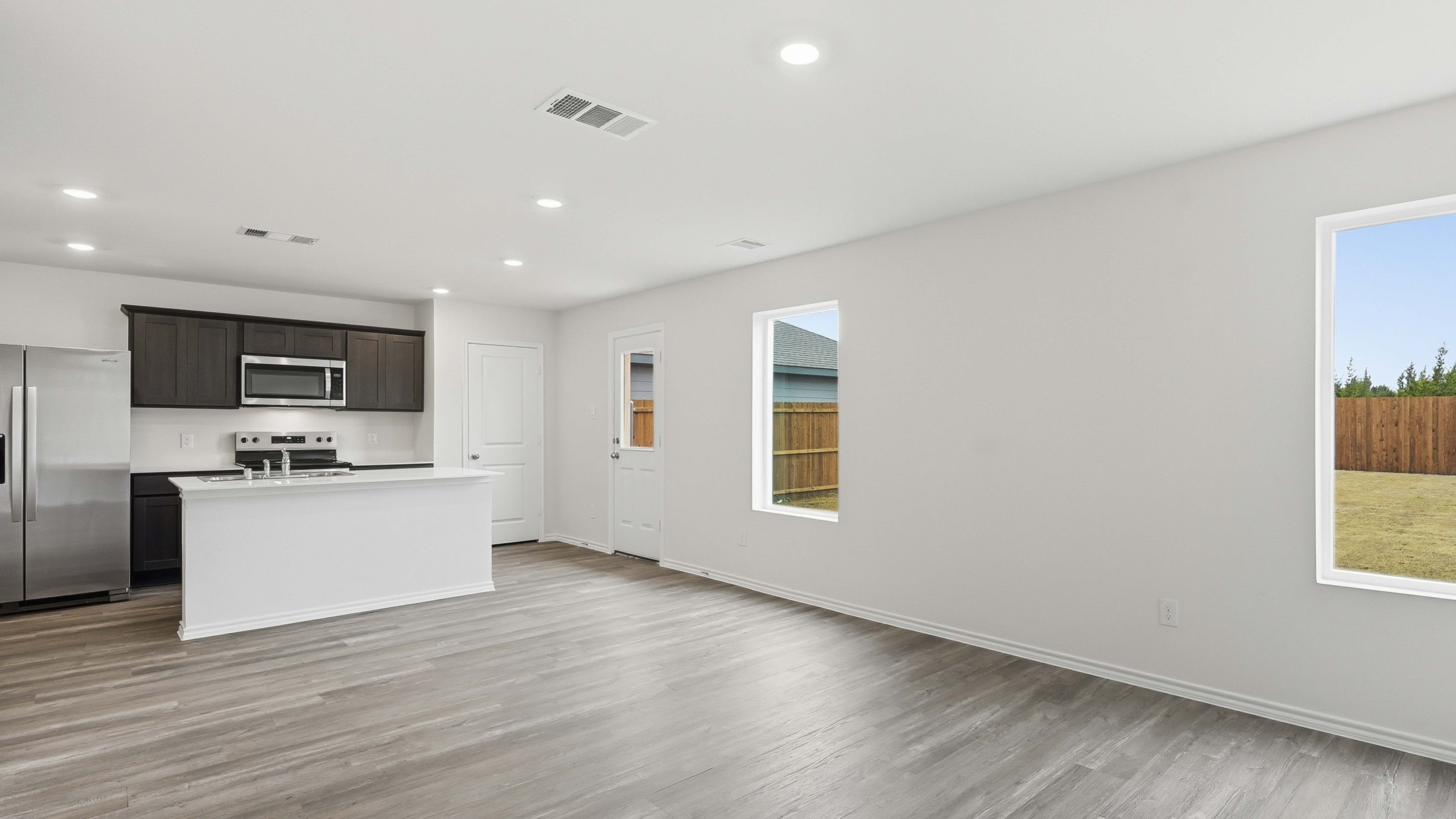 open concept living area with hardwood floors