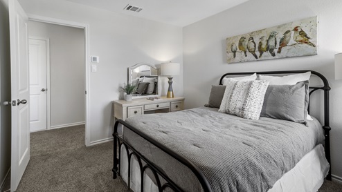 Bedroom with window and furnishings
