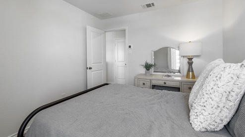 Bedroom with window and furnishings