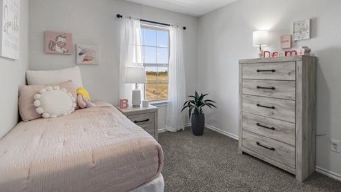 Bedroom with window and furnishings