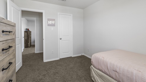 Bedroom with window and furnishings