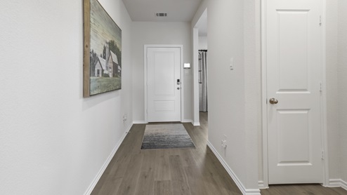 Model entry and long hallway