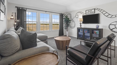 Large upstars media room with large beautiful window