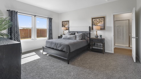 Bedroom with window and furnishings