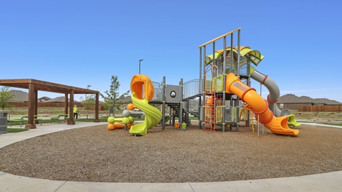 Riverfield Community Playground with slides and covered sitting area