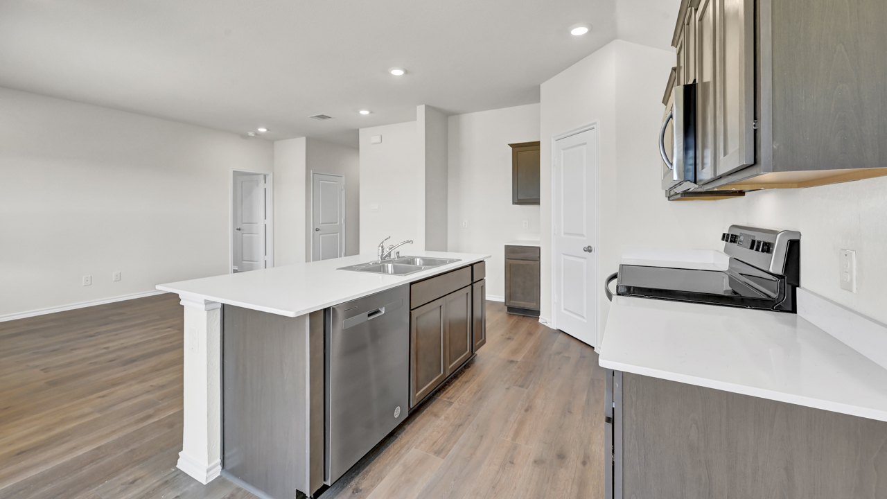 X40A kitchen area with view of the living room