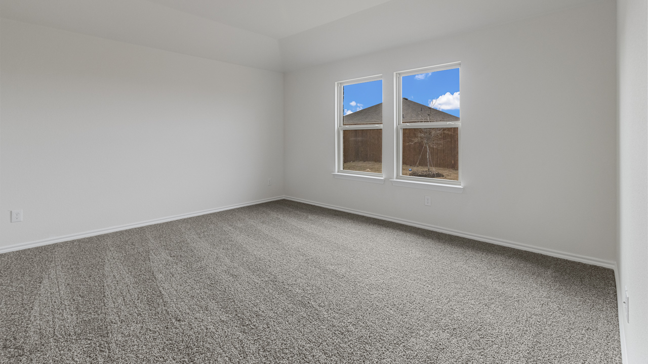 X40H primary bedroom with carpet
