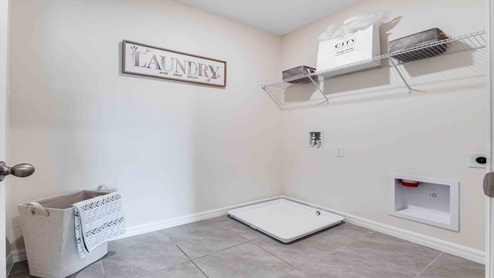 Spacious Laundry room for side by side washer and dryer