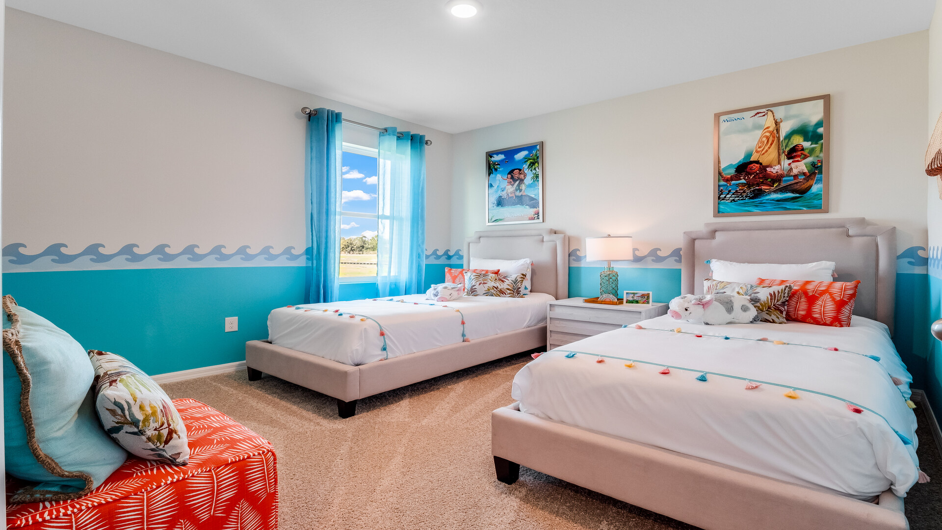 Child's room with toys, bedding, seating and storage and a spacious closet.