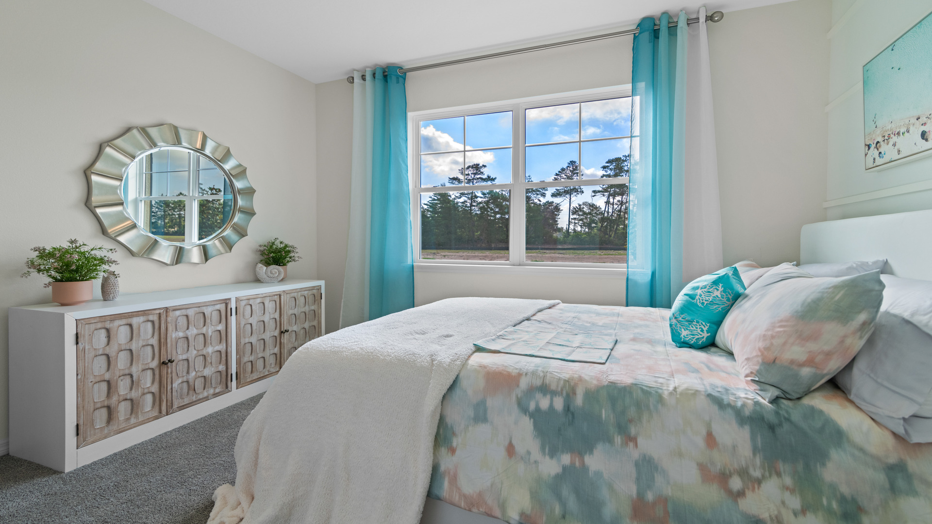 Guest bedroom with bed, nighstands and a roomy closet for storage.