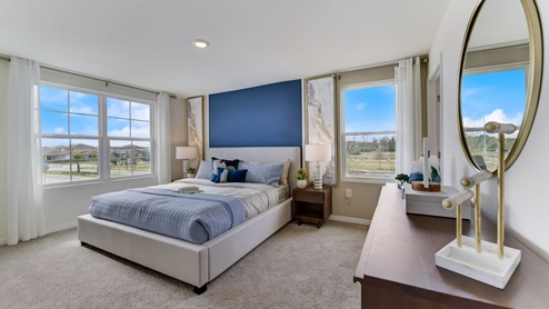 Spacious bedroom for king size bed and dresser.