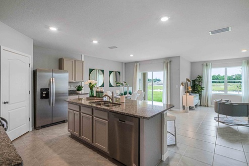 Kitchen with view overlooking living area