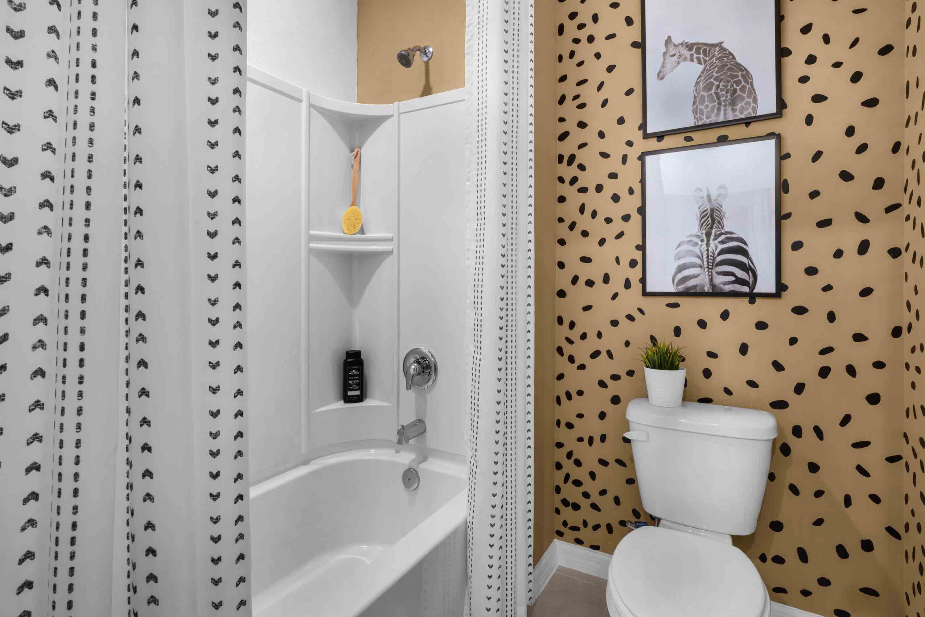 Bathroom with sink, counter space and walk in shower.