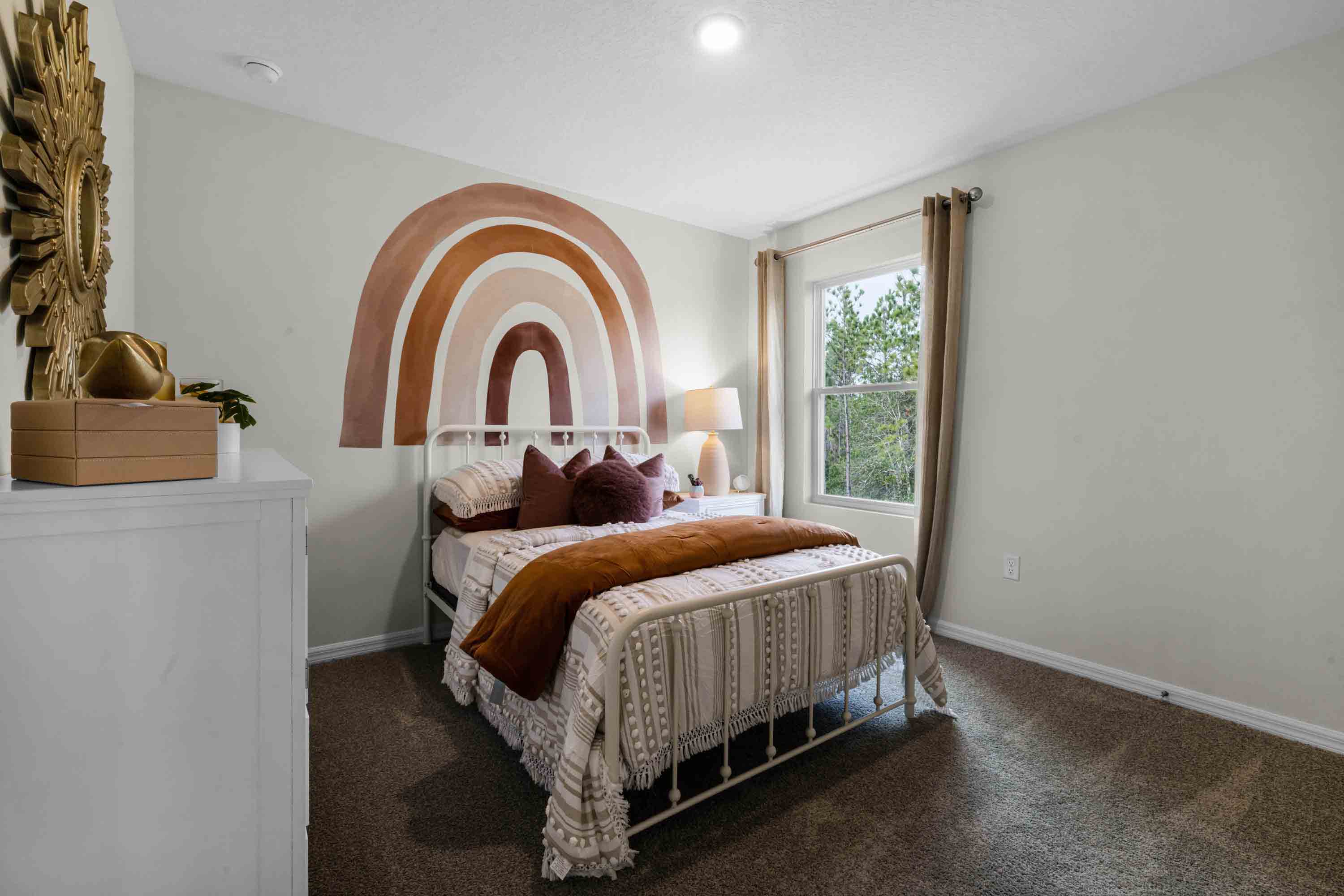 Guest bedroom with bed, nightstands and a roomy closet for storage.
